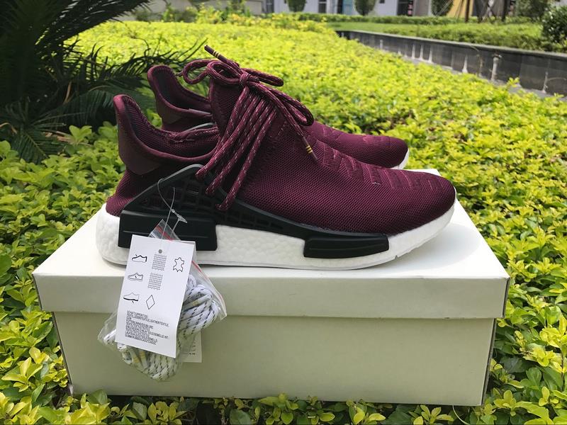 Adidas Human Race NMD Wine Red replica sneakers featuring a bold wine red upper, distinct lacing system, and signature branding for a stylish, high-quality look.