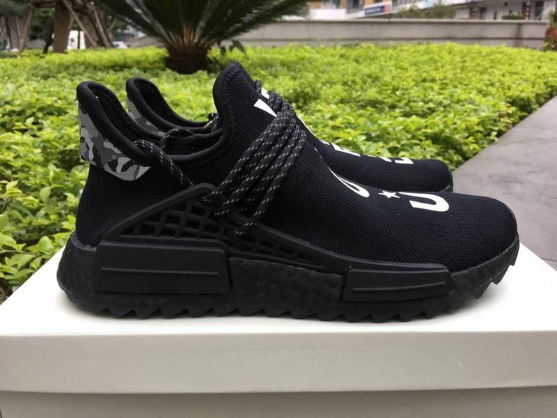 Adidas NMD Trail Human Race HU Pharrell NERD BB7603 Black White replica sneakers showcasing a stylish and modern design with a sleek black and white color scheme, ideal for fashion-forward sneaker enthusiasts.