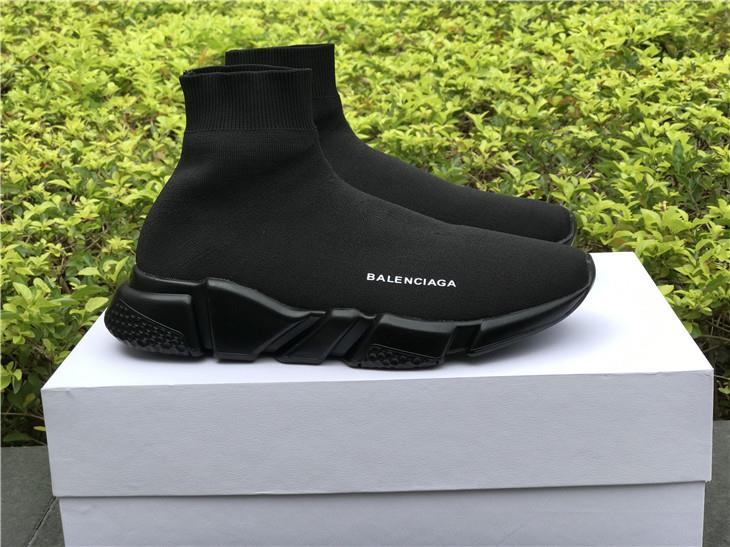Balenciaga Speed Trainer Black replica sneakers showcasing a sleek design with a knitted upper and contrasting white sole, ideal for fashion-forward sneaker enthusiasts.