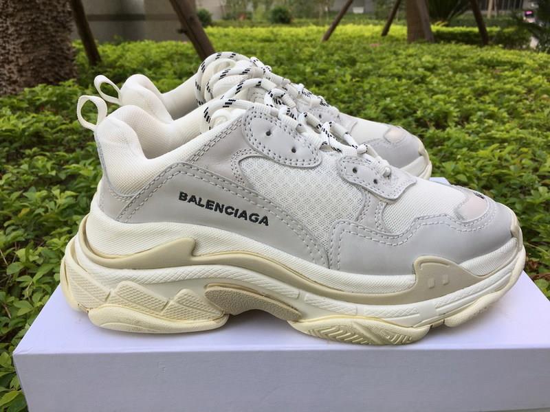 Balenciaga Triple S Creamy White replica sneakers featuring a stylish and modern design with a neutral color palette, showcasing high-quality materials and detailed craftsmanship, perfect for sneaker enthusiasts and fashion lovers.