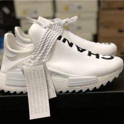 Adidas Human Race White replica sneakers featuring a sleek white upper, bold black lettering, and a comfortable boost sole, perfect for streetwear enthusiasts.