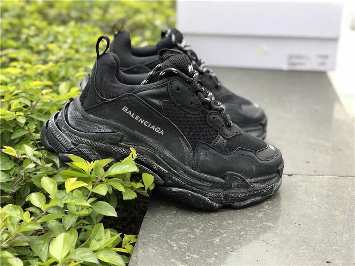 Balenciaga Triple S Trainer Black replica sneakers showcasing a stylish and trendy design, featuring a chunky silhouette, mixed materials, and a black colorway, perfect for fashion-forward individuals seeking high-quality footwear alternatives.