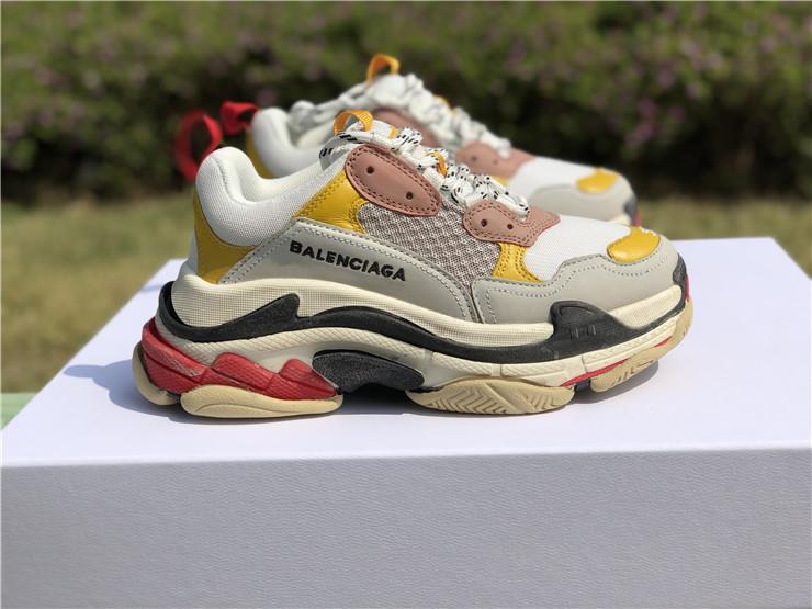 Balenciaga Triple S Yellow replica sneakers showcasing a vibrant yellow colorway with a chunky silhouette and premium detailing, ideal for streetwear enthusiasts.