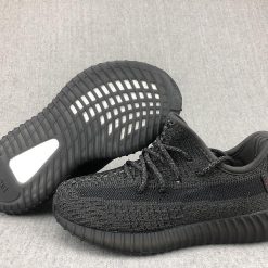 Adidas Yeezy Boost 350 V2 Black Kids replica sneakers featuring a sleek black design and signature stripe, perfect for young sneaker enthusiasts seeking stylish footwear.