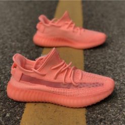 Adidas Yeezy Boost 350 V2 Pink GID replica sneakers showcasing a stylish and vibrant pink design with a sleek, comfortable silhouette, perfect for sneaker enthusiasts seeking high-quality options.