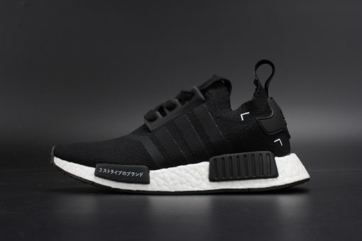 Adidas NMD R1 PK Japan Boost Black replica sneakers featuring a sleek black design, innovative Boost technology, and the signature Primeknit upper for a comfortable fit and stylish look.