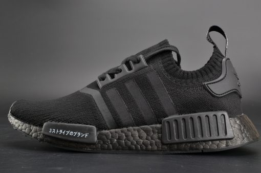 Adidas NMD R1 Primeknit Japan Triple Black replica sneakers featuring a sleek all-black design, breathable Primeknit upper, and iconic Boost cushioning for comfort and style.