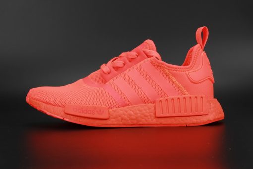 Adidas NMD R1 Triple Solar Red replica sneakers featuring a vibrant red upper, breathable mesh material, and iconic three-stripe branding, perfect for casual wear and street style fashion.