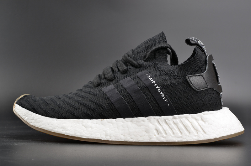Adidas NMD R2 Primeknit Japan Black high-quality replica sneakers showcasing a sleek black design with comfortable Primeknit upper, perfect for style and performance.