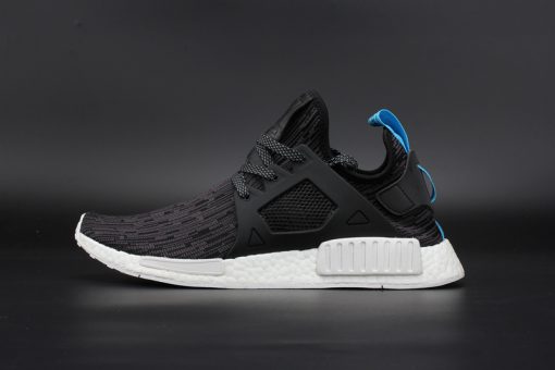 Adidas NMD XR1 PK Primeknit Glitch Black replica sneakers featuring a sleek black design with glitch pattern detailing, perfect for stylish streetwear enthusiasts.