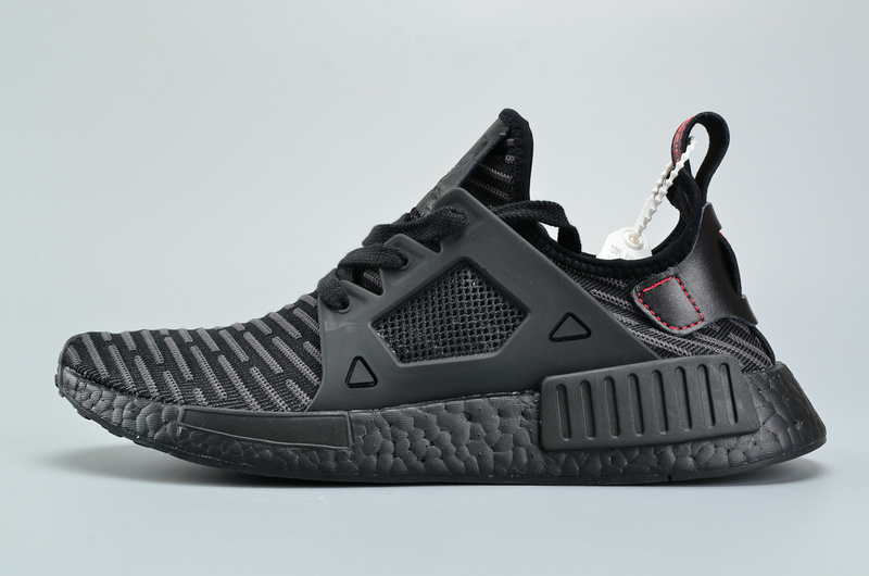 Adidas NMD XR1 Primeknit Triple Black BA7214 high-quality replica sneakers showcasing a sleek all-black design with a comfortable Primeknit upper, perfect for sneaker enthusiasts seeking stylish and durable footwear.