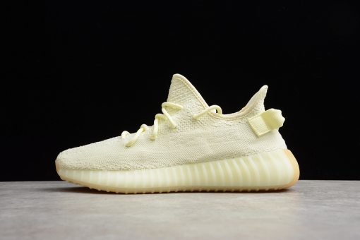 Adidas Yeezy Boost 350 V2 Butter replica sneakers showcasing a sleek design with a soft yellow colorway, featuring the iconic striped side accent and comfortable boost sole for a stylish and fashionable look.