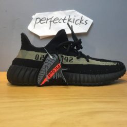 Adidas Yeezy Boost 350 V2 Core Black Green replica sneakers showcasing a sleek black upper with vibrant green accents, designed for style and comfort, perfect for sneaker enthusiasts seeking high-quality replicas.