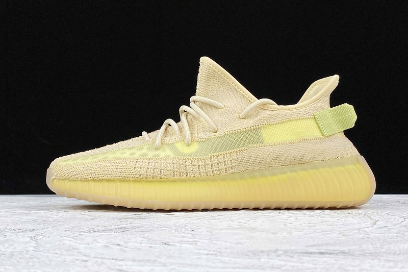 Adidas Yeezy Boost 350 V2 Flax FX9028 replica sneakers featuring a distinctive flax-colored primeknit upper, signature side stripe, and Boost cushioning for ultimate comfort and style.