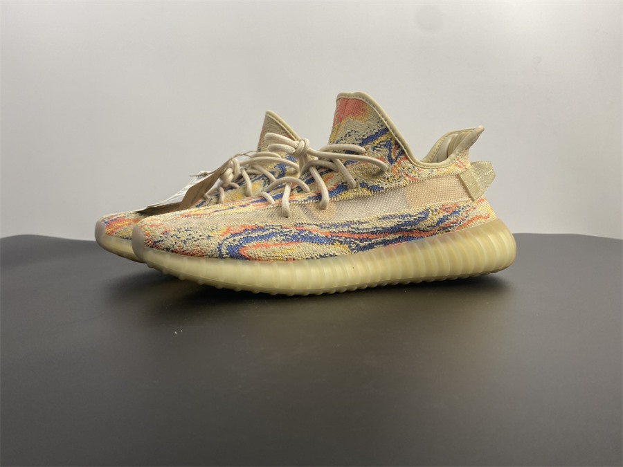 Adidas Yeezy Boost 350 V2 MX Oat replica sneakers featuring a stylish design with a blend of earthy tones and a comfortable silhouette, perfect for sneaker enthusiasts and casual wearers alike.