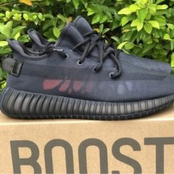 Adidas Yeezy Boost 350 V2 Mono Cinder replica sneakers featuring a sleek black design with a breathable primeknit upper and distinct translucent side stripe, perfect for fashion-forward sneaker enthusiasts.