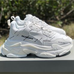 Balenciaga Allover Logo Triple S White Sneaker, a high-quality replica sneakers featuring a sleek white design, iconic logo detailing, and stylish chunky silhouette ideal for fashion-forward enthusiasts.