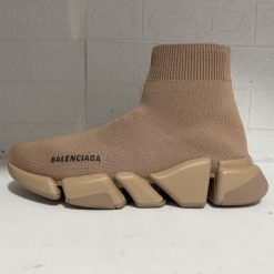 Balenciaga Speed 2.0 Beige Sneaker replica sneakers showcasing a sleek and modern design, perfect for fashion-forward individuals looking for high-quality alternatives.