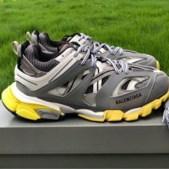 Replica Balenciaga Track Grey White Yellow Sneaker, high-quality replica sneakers featuring a stylish design with a mix of grey, white, and yellow colors, perfect for any casual outfit.
