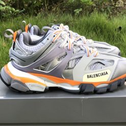 Balenciaga Track Silver Orange Purple Sneaker replica sneakers featuring a sporty design with contrasting colors and a comfortable silhouette, perfect for fashion-forward individuals looking for high-quality alternatives.