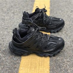 Balenciaga Track Triple Black Sneaker replica sneakers showcasing a sleek all-black design, featuring a chunky sole and breathable mesh panels, perfect for streetwear enthusiasts seeking high-quality alternatives.