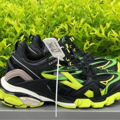 Balenciaga Track 2 Black Fluorescent Yellow Sneaker replica sneakers featuring a bold color combination, chunky design, and modern athletic style, perfect for sneaker enthusiasts seeking high-quality replicas.