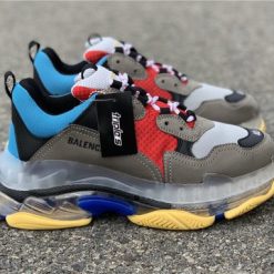 Balenciaga Triple S Clear Sole Blue Red replica sneakers featuring a bold color combination and clear sole design, perfect for fashion enthusiasts seeking high-quality alternatives.