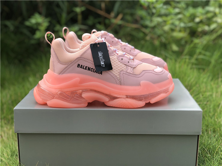 SEO Alt Text: "Balenciaga Triple S Clear Sole Light Pink replica sneakers showcasing a stylish design with a clear sole and premium materials, perfect for fashion-forward footwear enthusiasts."