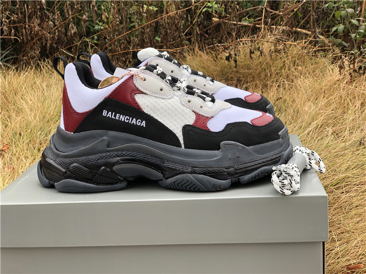 SEO Alt Text: "Balenciaga Triple S Clear Sole sneakers featuring a stylish white, red, and black design, showcasing high-quality craftsmanship ideal for those seeking premium replica sneakers."
