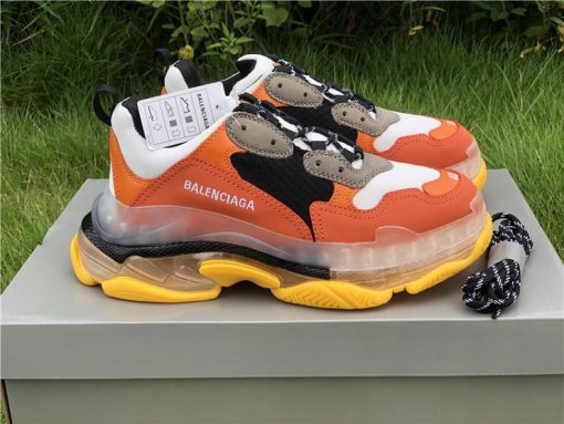 Alt Text: "Balenciaga Triple S Orange Yellow replica sneakers showcasing vibrant orange and yellow hues, featuring a chunky design and layered sole, perfect for stylish footwear enthusiasts looking for high-quality shoes."