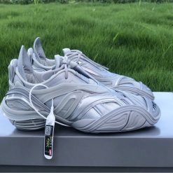 Balenciaga Tyrex Silver Grey Sneaker, featuring a sleek and modern design with a metallic silver finish, showcasing high-quality materials and craftsmanship, ideal for those seeking stylish replica sneakers to elevate their shoe collection.
