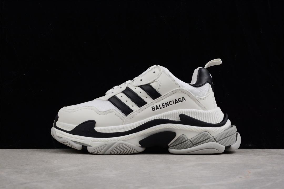 Balenciaga x Adidas Triple S White Black Sneaker - A high-quality replica sneaker featuring a sleek white and black design, showcasing premium craftsmanship and stylish aesthetics, perfect for sneaker enthusiasts looking for fashionable shoes.