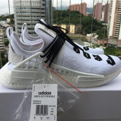 Fear Of God X Adidas NMD Pharrell Williams Human Race White Black replica sneakers showcasing a sleek design with a striking black and white colorway, featuring premium materials and iconic branding, perfect for sneaker enthusiasts and collectors.