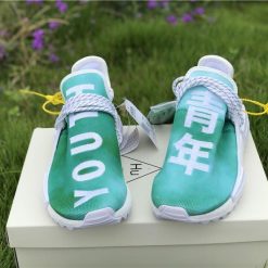 Pharrell X Adidas NMD Human Race Green replica sneakers featuring a vibrant green upper, bold text detailing, and a sleek design perfect for sneaker enthusiasts.