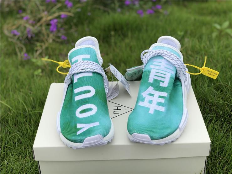 Pharrell X Adidas NMD Human Race Green replica sneakers featuring a vibrant green upper, bold text detailing, and a sleek design perfect for sneaker enthusiasts.