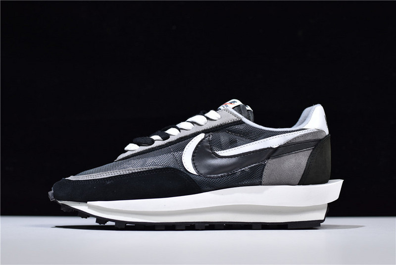 Sacai Nike LD Waffle Black BV0073 001 replica sneakers featuring a sleek black design, layered textures, and a distinctive waffle outsole for enhanced style and comfort.