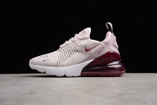 Close-up view of the Wmns Nike Air Max 270 Barely Rose, showcasing its stylish design and quality construction, perfect for sneaker enthusiasts seeking high-quality replica sneakers. These fashionable shoes feature a soft pink hue and a signature air cushioning for comfort.