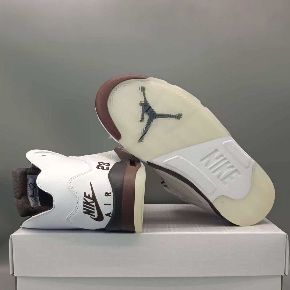 A Ma Maniére x Jordan 5 Retro OG 'Black Collective' high-quality replica sneakers featuring a sleek black design with premium materials and unique branding elements, perfect for sneaker enthusiasts and collectors.