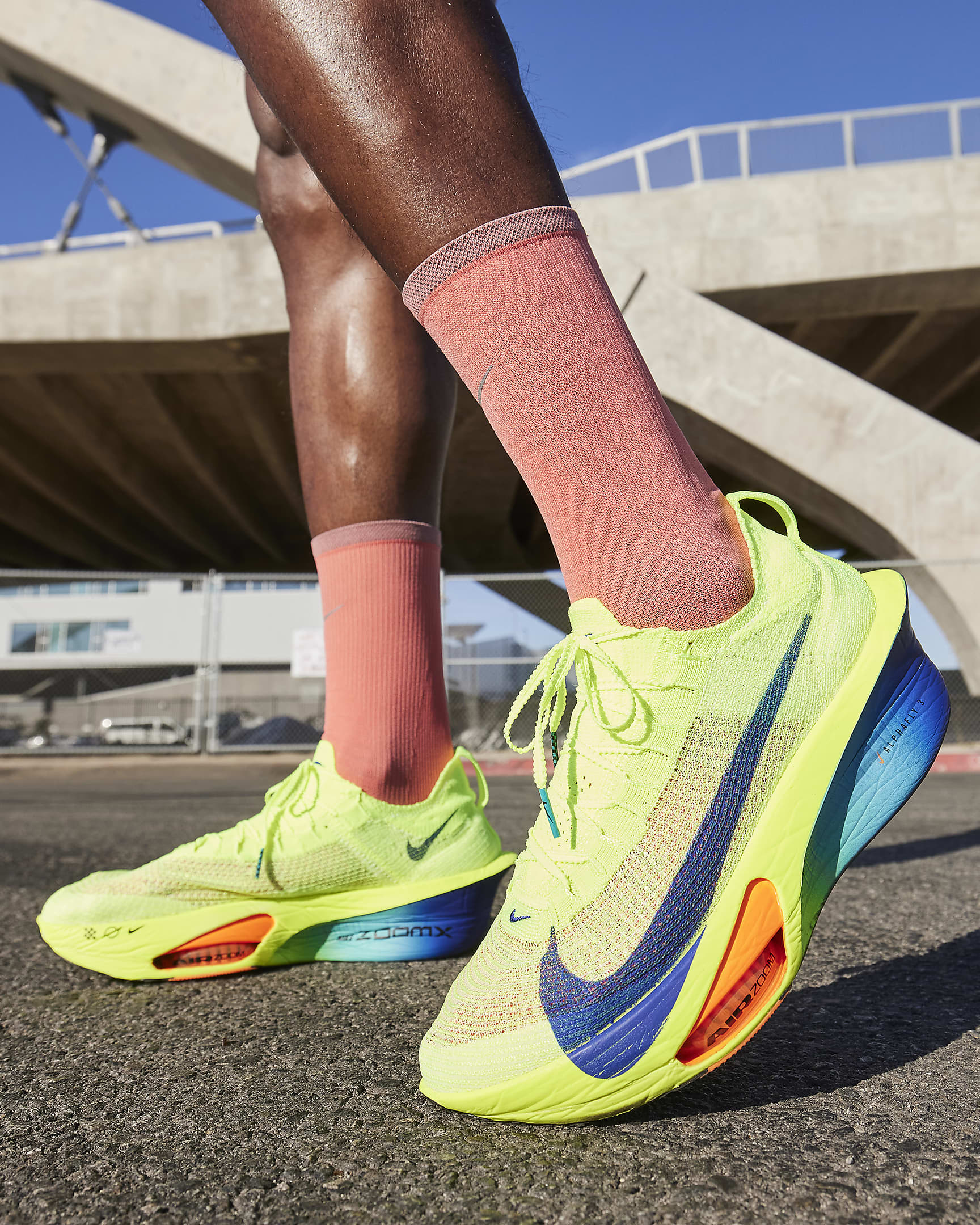 High-quality replica sneakers featuring the Air Zoom Alphafly Next 3 design, showcasing a vibrant colorway, advanced cushioning technology, and a sleek silhouette ideal for running and athletic performance.