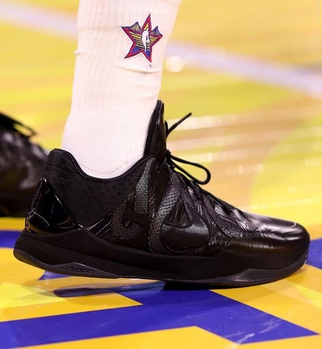Kobe 5 Protro Year of the Mamba 'Triple Black' high-quality replica sneakers showcasing a sleek all-black design with premium materials and intricate detailing, perfect for basketball enthusiasts and sneaker collectors.