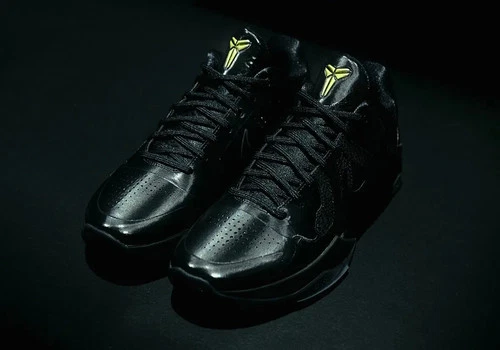 High-quality replica sneakers featuring the Kobe 5 Protro Year of the Mamba in a sleek Triple Black colorway, designed for basketball enthusiasts and sneaker collectors.