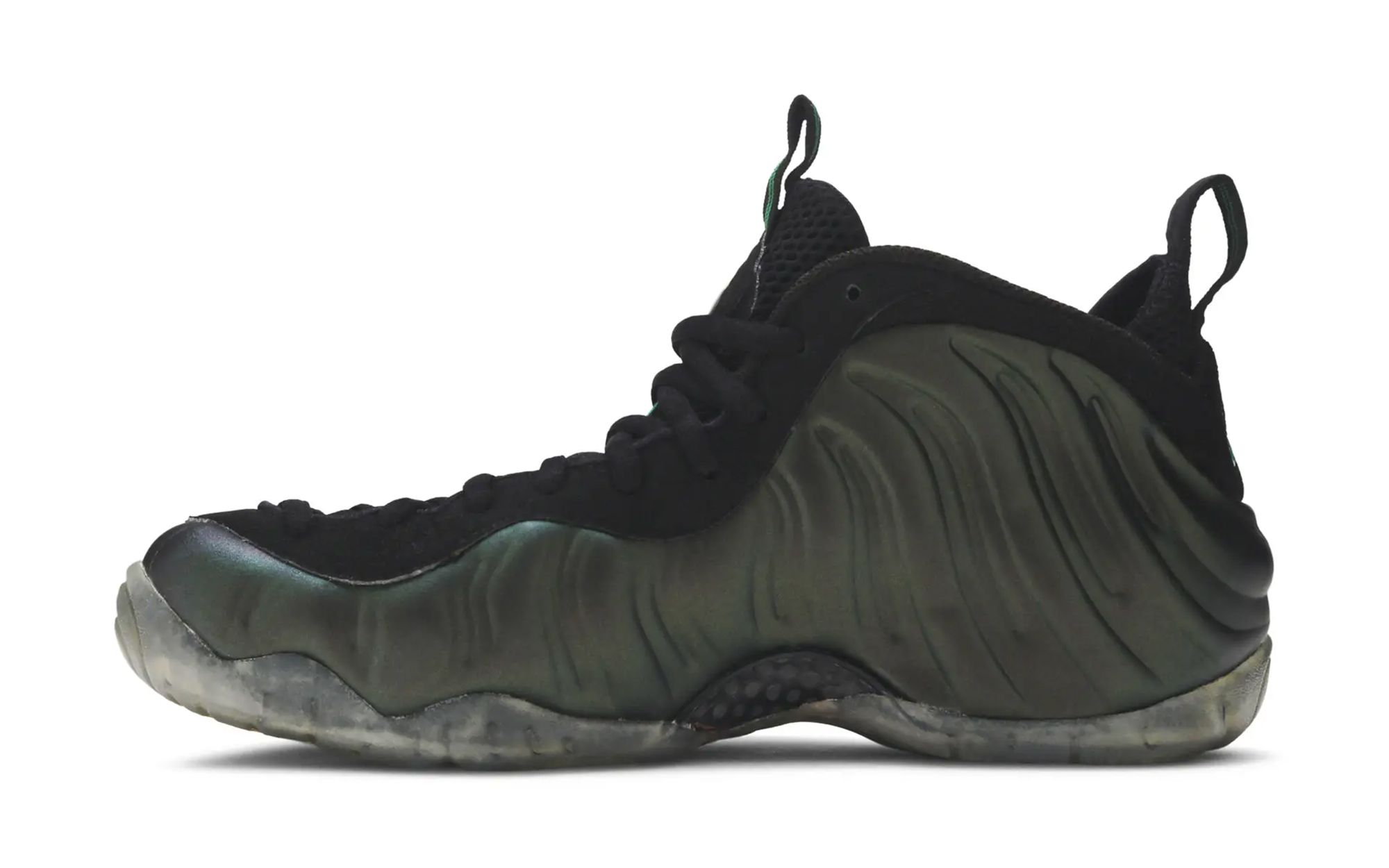 High-quality replica sneakers featuring the Nike Air Foamposite Pro Pine Green model, showcasing its signature sleek design and vibrant colorway.
